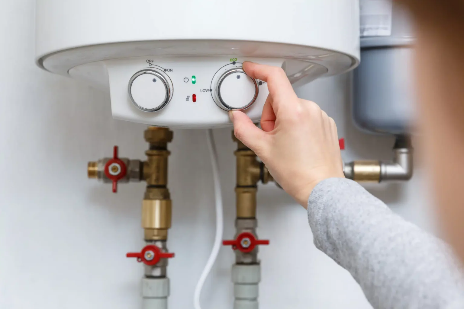 Technician adjusting a water heater in Ladera Ranch